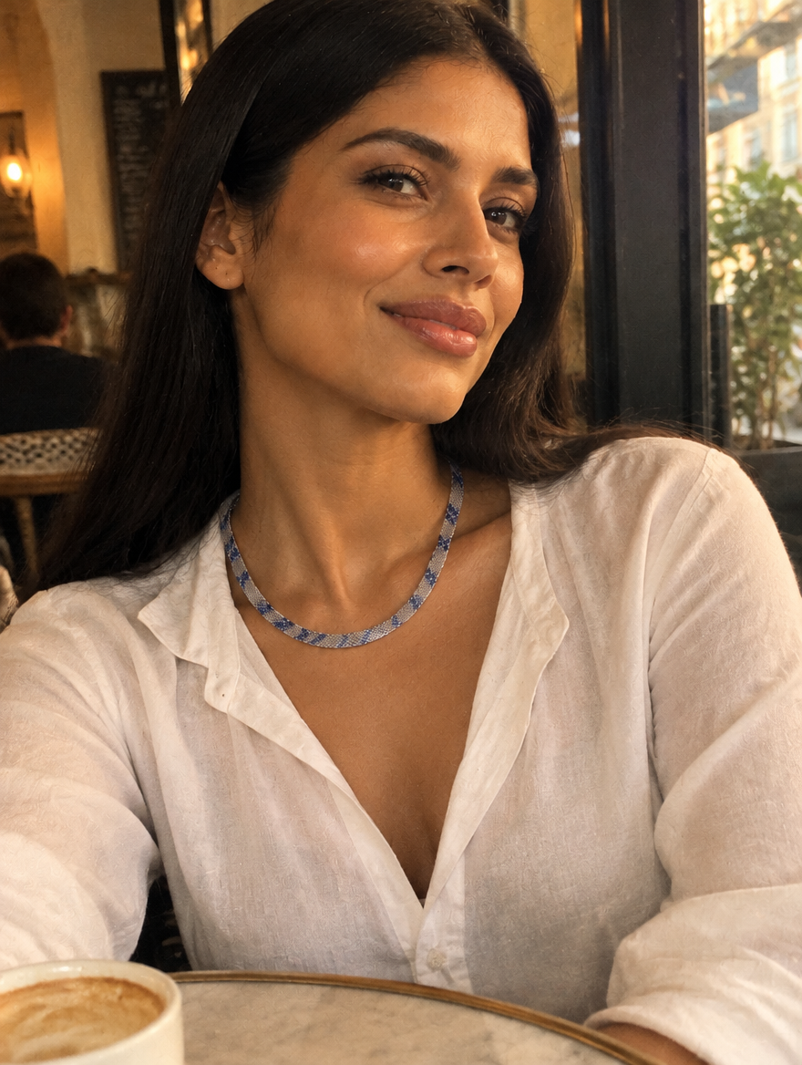 Casual customer wearing Vexa ice blue necklace